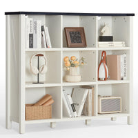White wood bookcase with open cubby shelves and dark top panel