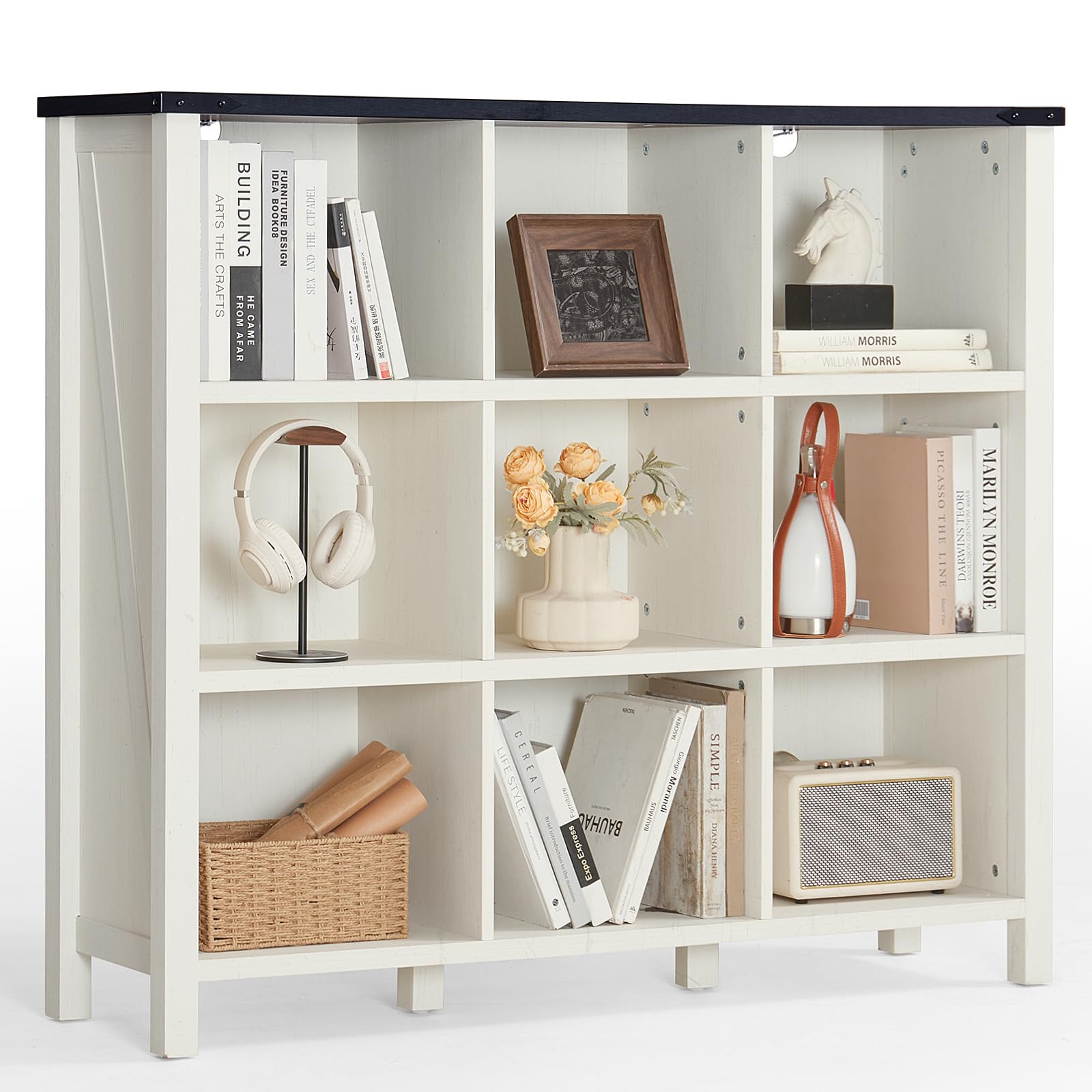 White wood bookcase with open cubby shelves and dark top panel