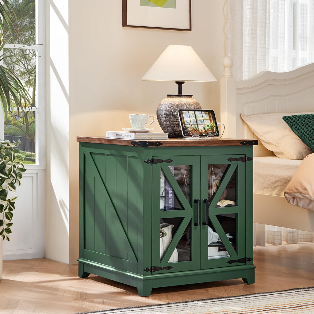 Green farmhouse end table with glass barn doors and wooden top in a living room
