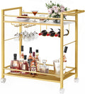 Gold rolling bar cart with two open shelves, wine rack, and hanging stemware holders.