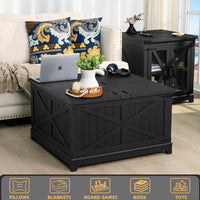 Black coffee table set with geometric panels and open storage section on top.