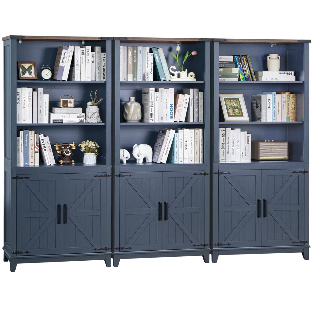 Blue tall bookcase with open shelves and barn-style cabinet door fronts