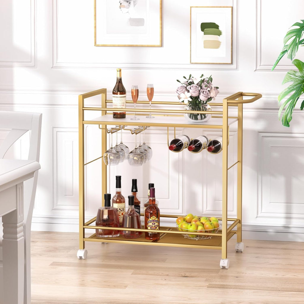 Gold rolling bar cart with two shelves, wine rack on side, and hanging glass holders.