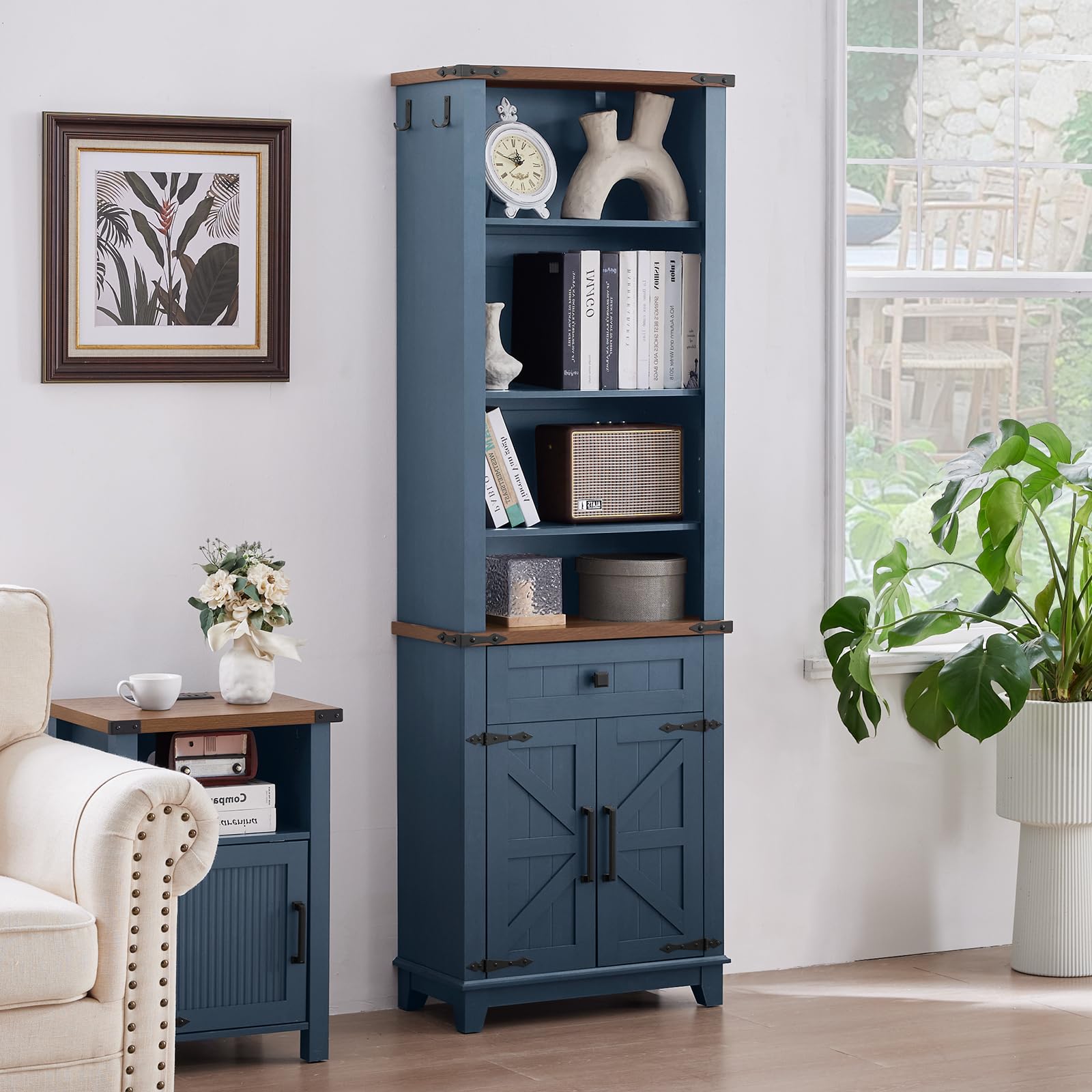 Blue freestanding bookcase cabinet with open top shelves and two lower door panels