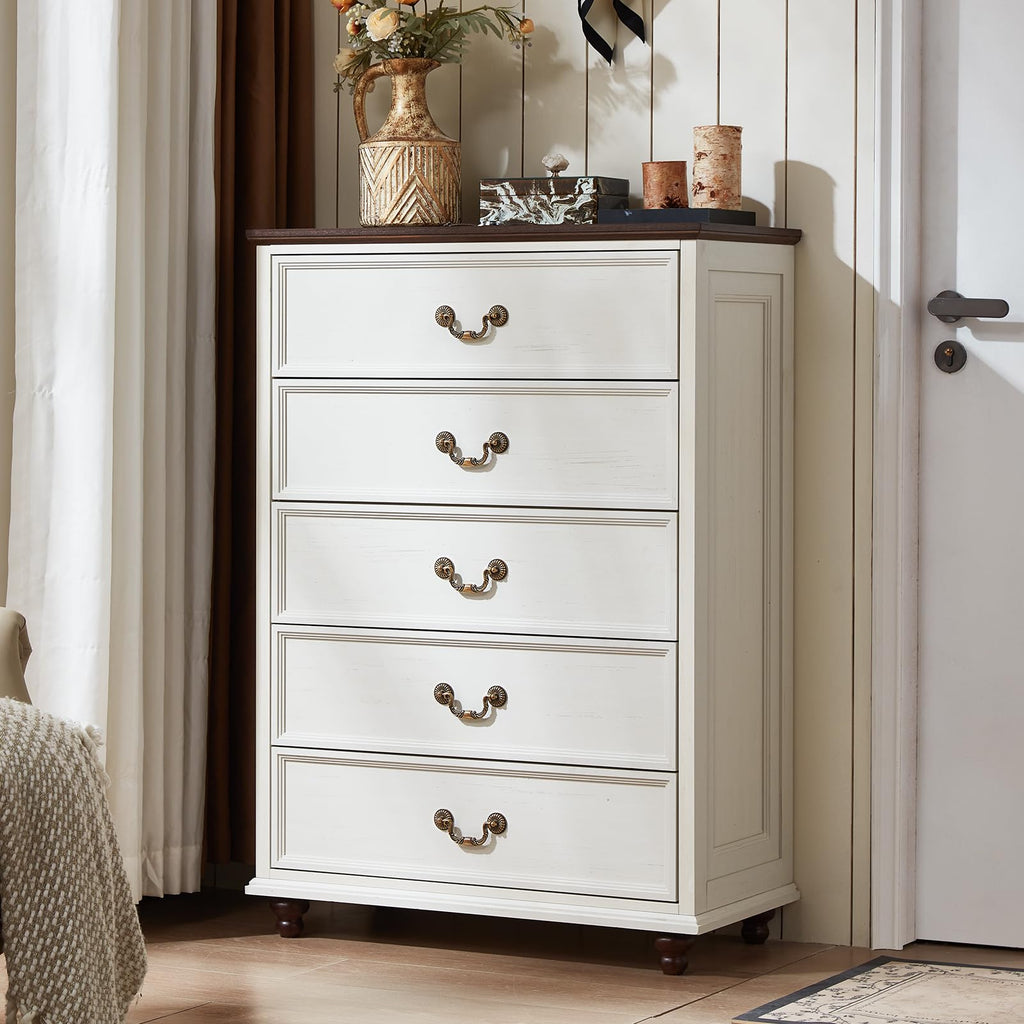 White wooden dresser with multiple drawers and brass-tone drawer pulls