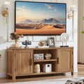 Dark wood farmhouse TV console with two cabinet doors and open center shelves