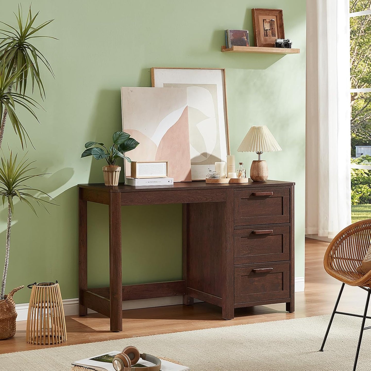 Dark walnut executive desk with three drawers and centered open shelf