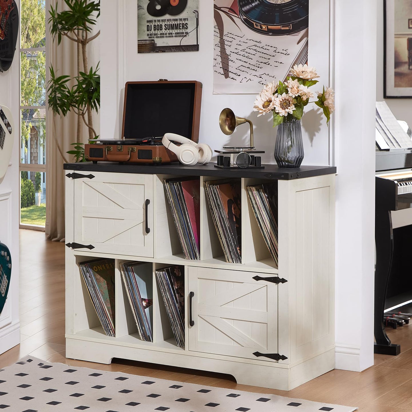 White record player stand cabinet with multiple vinyl shelves and dark top surface