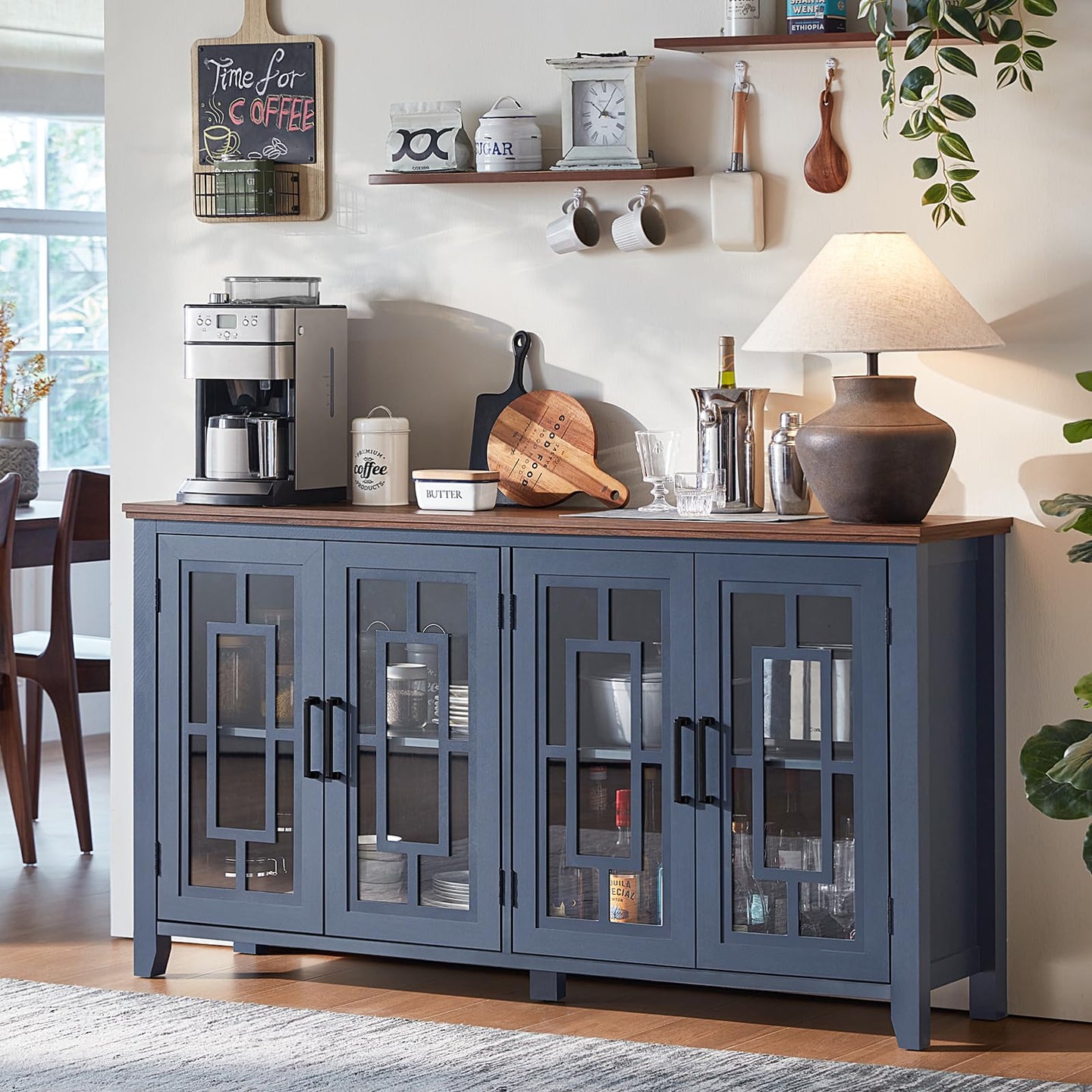 Blue sideboard cabinet with multiple glass doors and cabinet storage for tableware