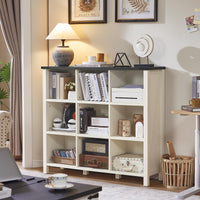 White farmhouse bookcase console with open shelves and display cubbies for books