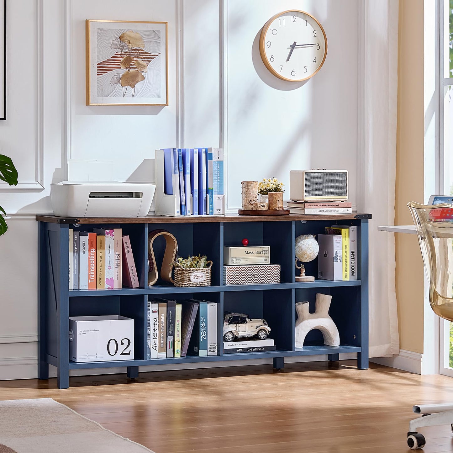 Dark blue open bookcase with display cubbies and wide top shelf for books