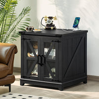 Black farmhouse end table with X-panel doors and glass insert, flat black tabletop