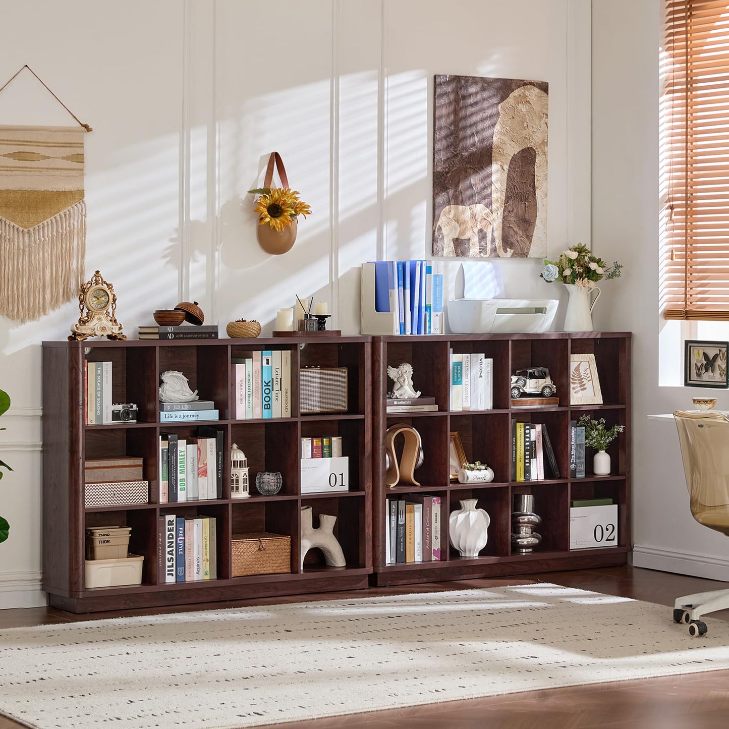Wooden cube storage book shelf with curved edge, open cubbies, and decorative items inside.