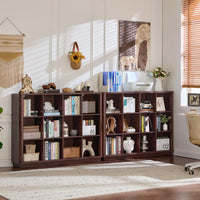 Wooden cube storage book shelf with curved edge, open cubbies, and decorative items inside.