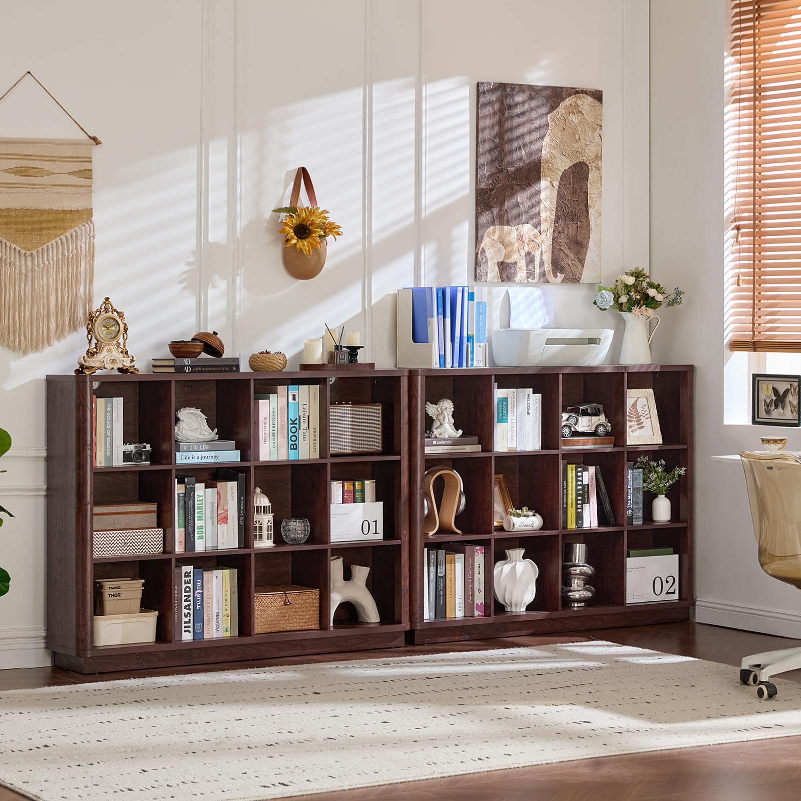 Wooden cube storage book shelf with curved edge, open cubbies, and decorative items inside.