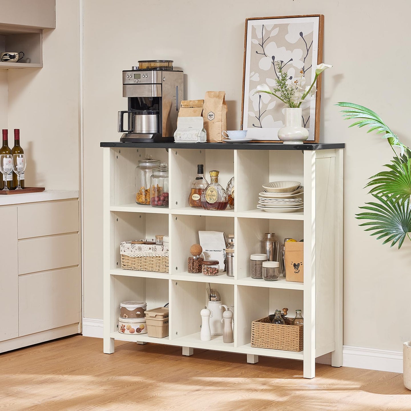 White low farmhouse bookcase with open compartments, shelves, and four legs for books and decor