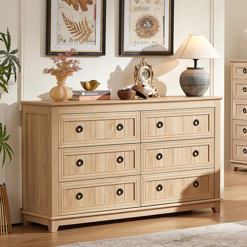 Natural wood dresser with six drawers and dark round knob pulls