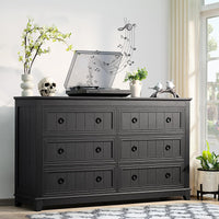 Dark wood dresser with 6 drawers and black round knob handles
