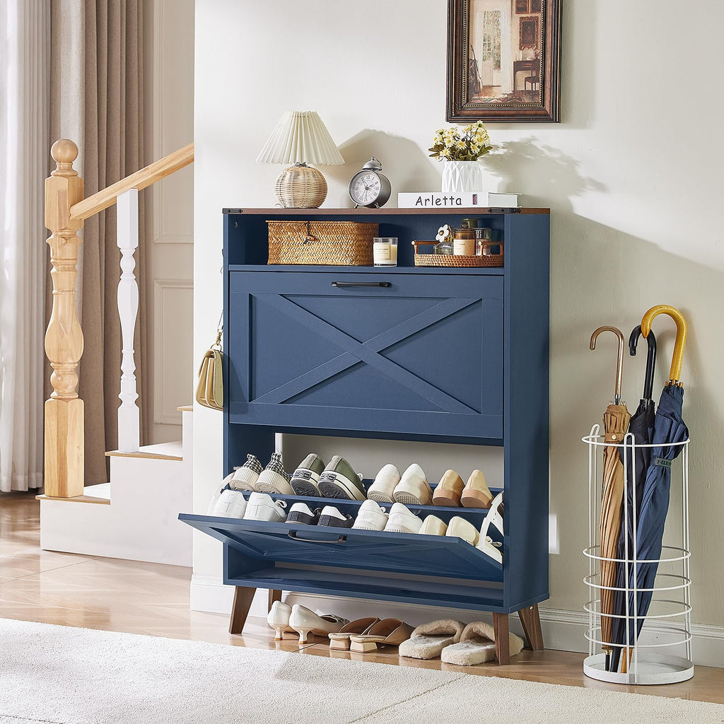 Navy shoe storage cabinet with open bottom shelf and arranged shoes