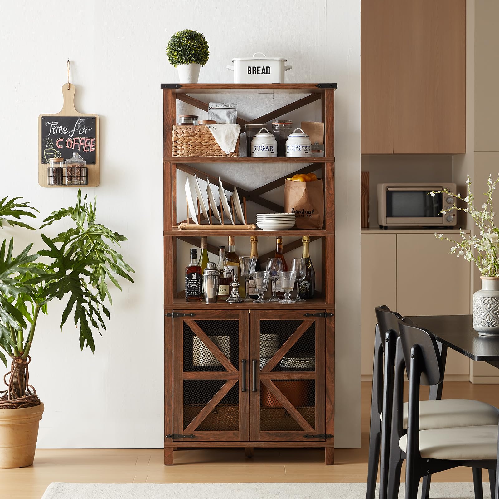 Black farmhouse bookcase with barn doors, open shelves, and cabinet drawer