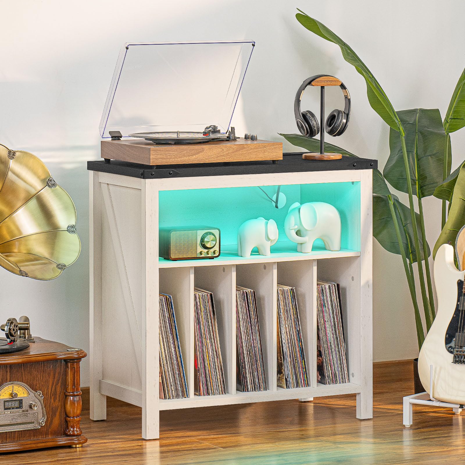 White record player cabinet with brown top, teal LED shelf, headphones