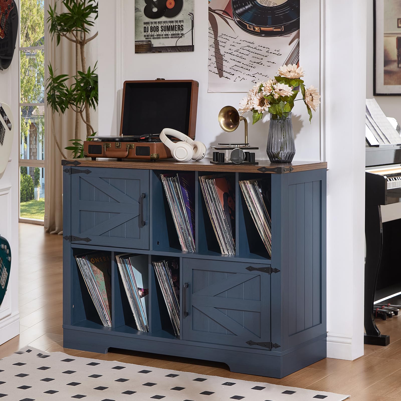 Navy blue record player cabinet with shelves and barn-style doors for vinyl records