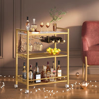 Gold bar cart with 3-tier shelving, wine rack, glass holder, and rolling wheels