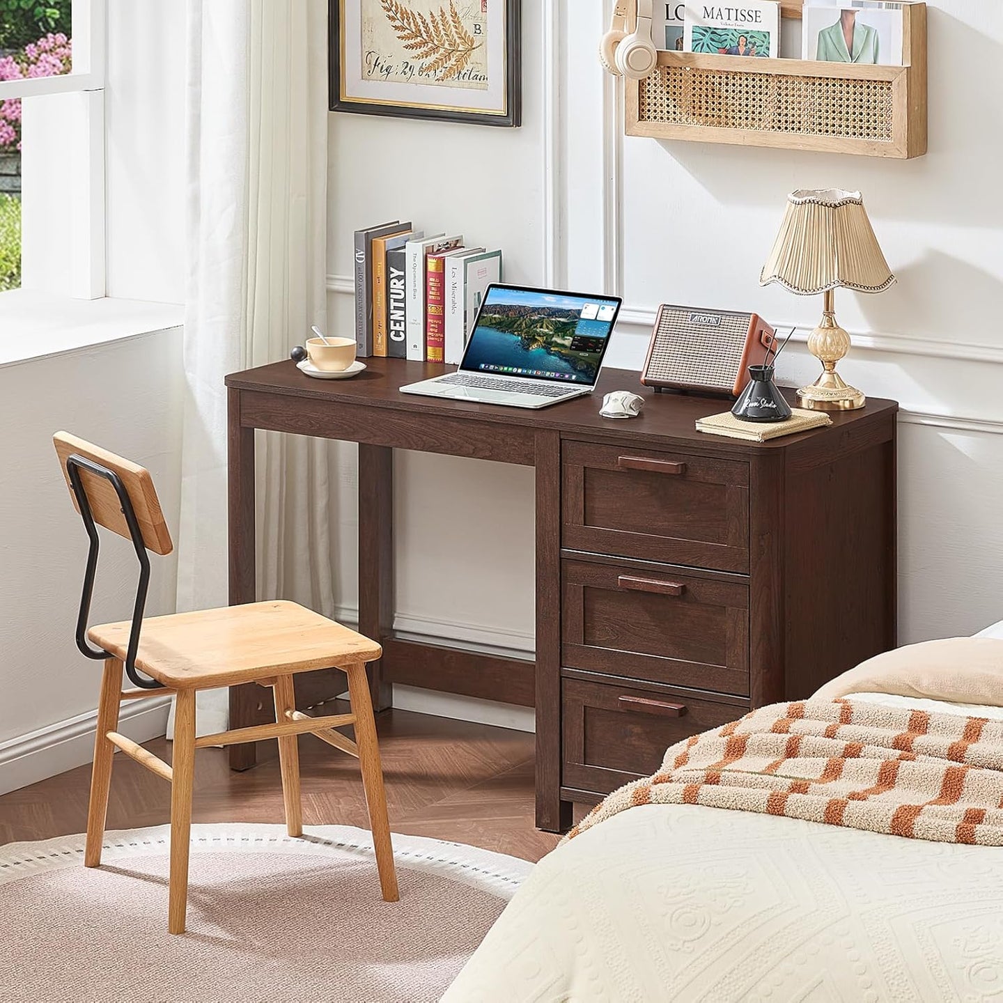 Dark walnut executive desk with three drawers and pull handles