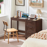 Dark walnut executive desk with three drawers and pull handles