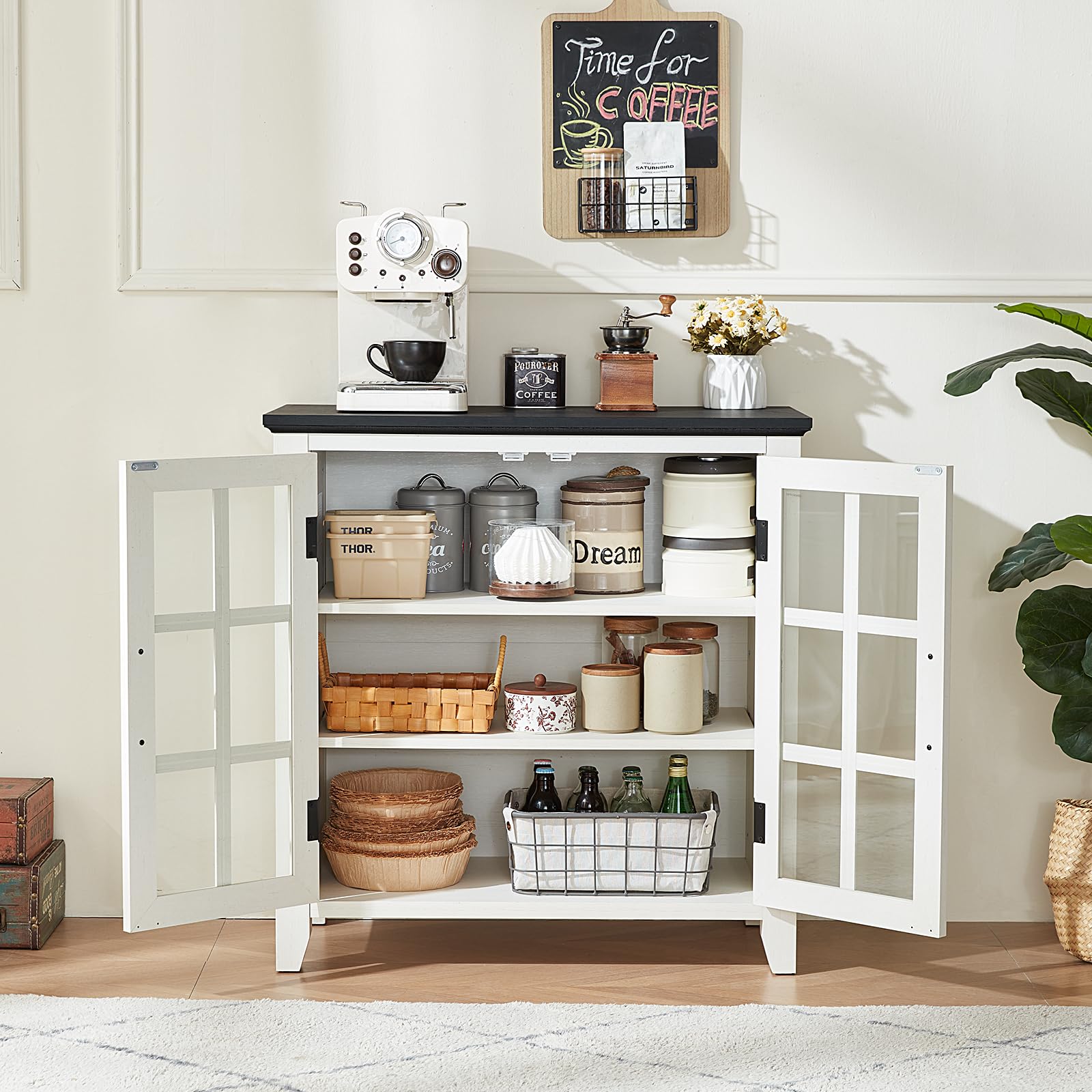 White sideboard buffet cabinet with two open compartments and black top, glass doors