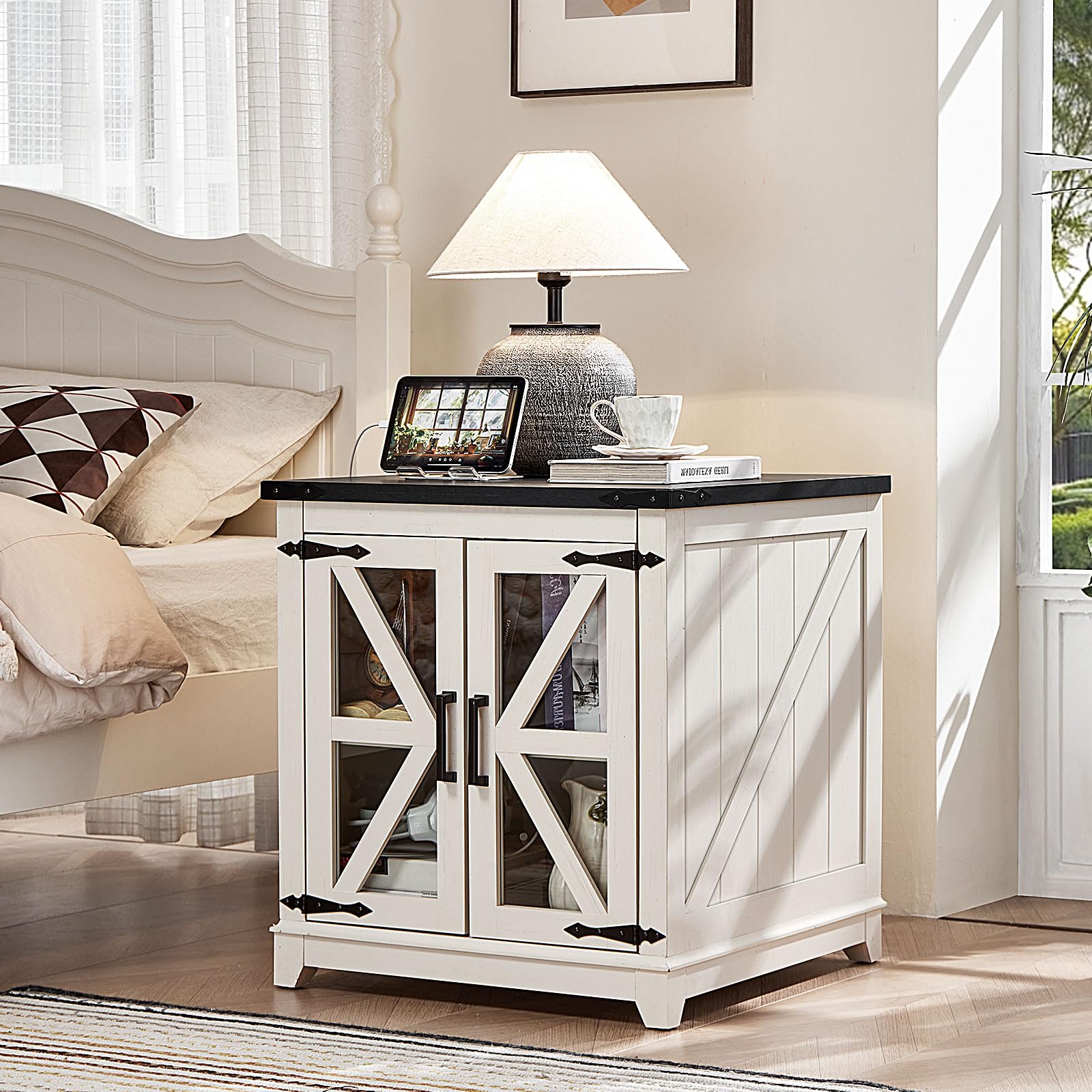Farmhouse end table with barn-door glass panels and white finish, open storage.