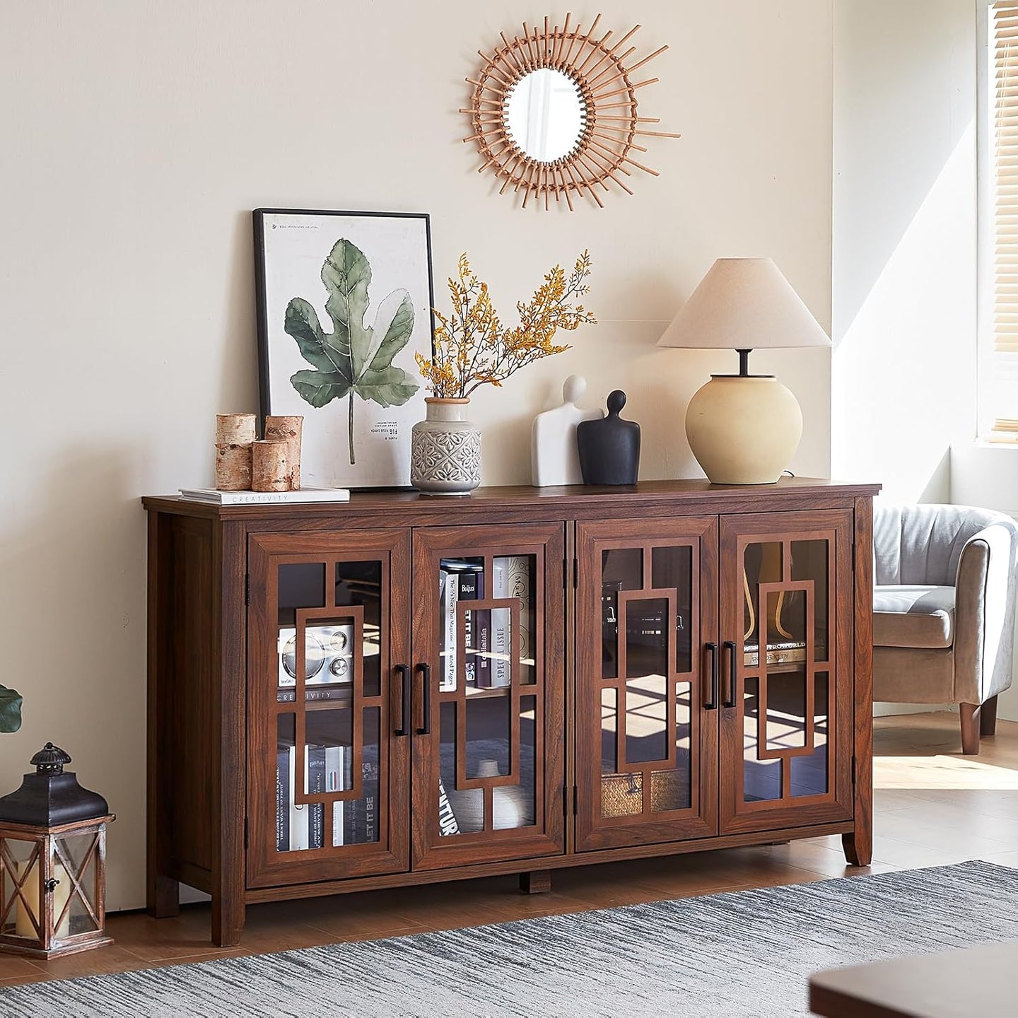 Brown wood sideboard with four glass door panels and black metal handles