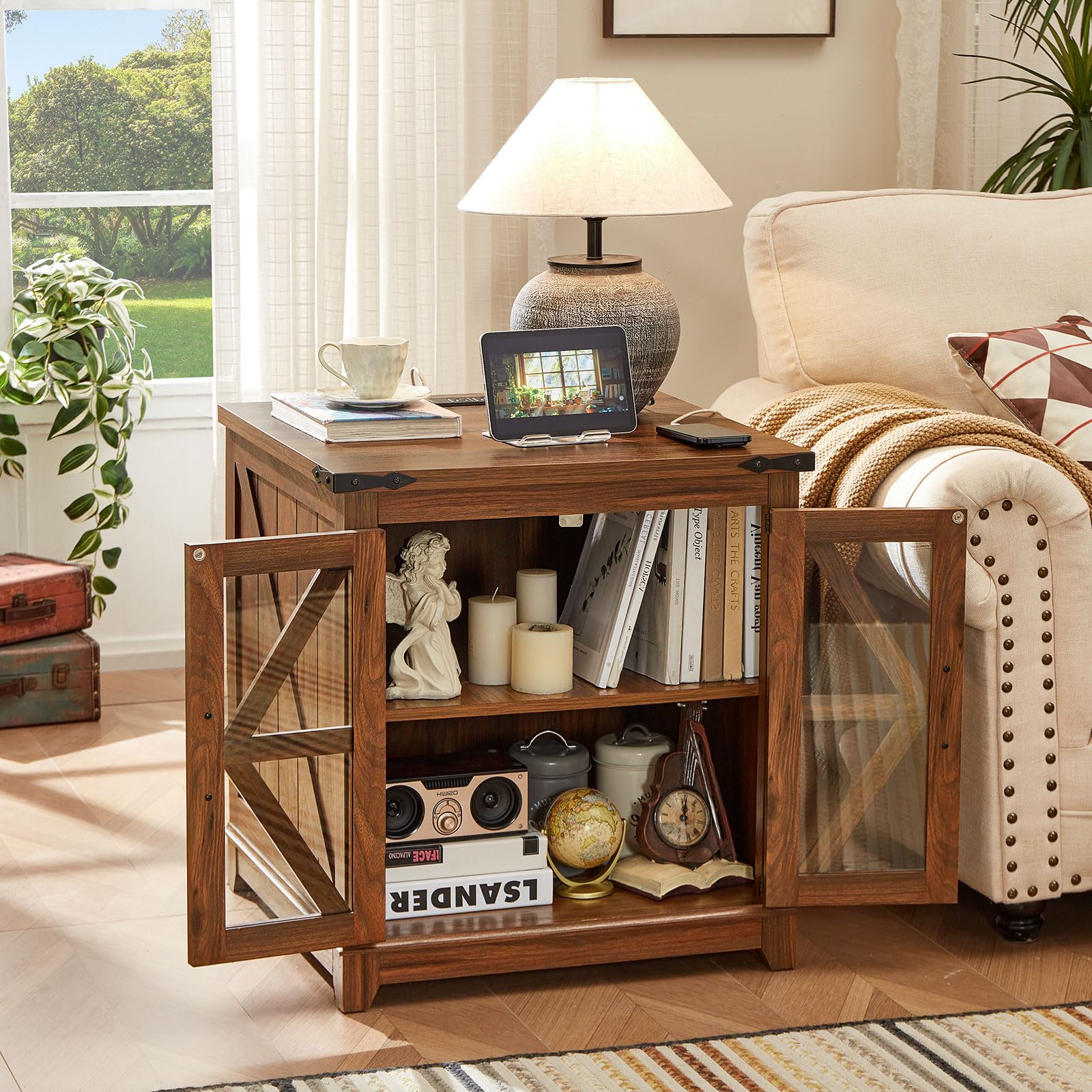 Brown farmhouse end table with black top and open display shelves behind glass doors