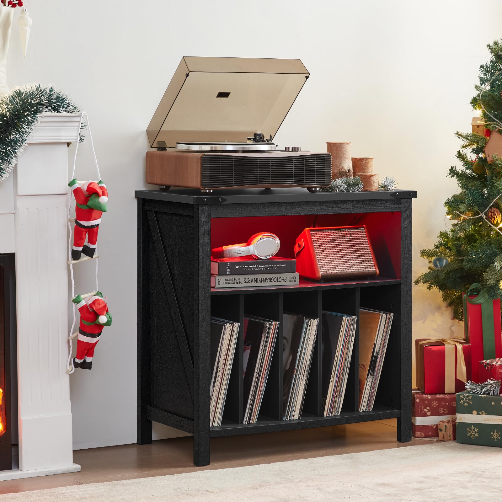 Black record player cabinet with open shelves for vinyl records and display cubby.