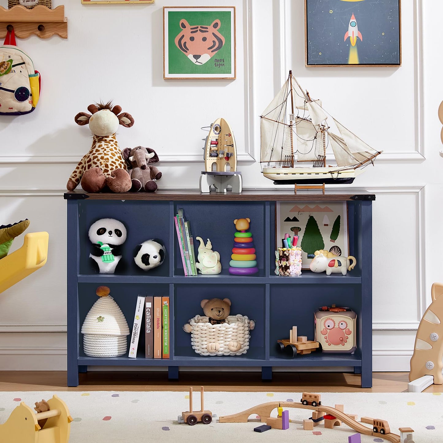 Dark blue open-shelf bookcase with cubbies and lower compartments, farmhouse style