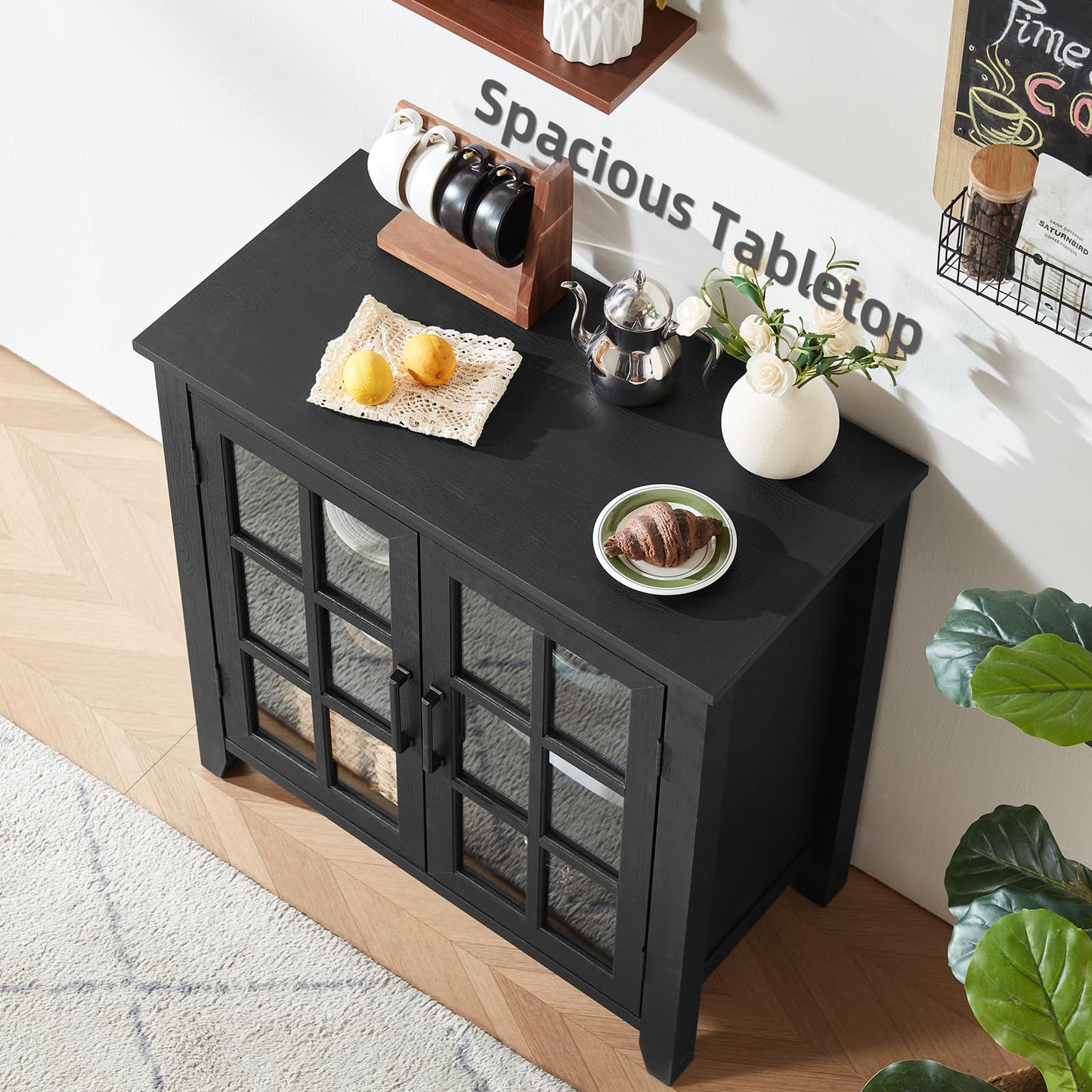 Black sideboard buffet cabinet with glass-panel doors and flat countertop surface