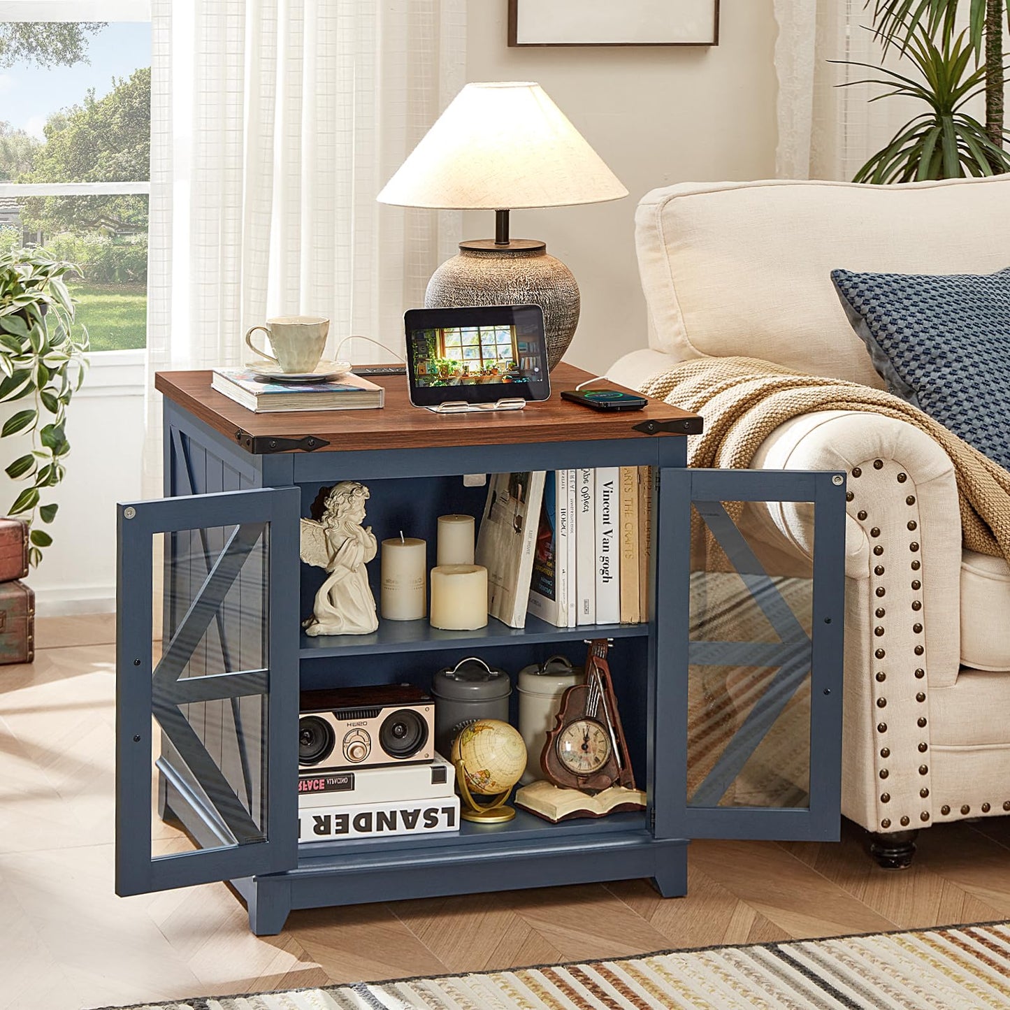 Farmhouse end table with barn-door glass panels, open shelves, blue finish.