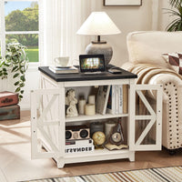 White wood end table with black top and open shelves behind glass barn doors