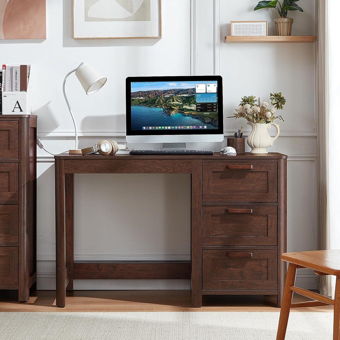 Dark walnut executive desk with three drawers and open under-desk shelf