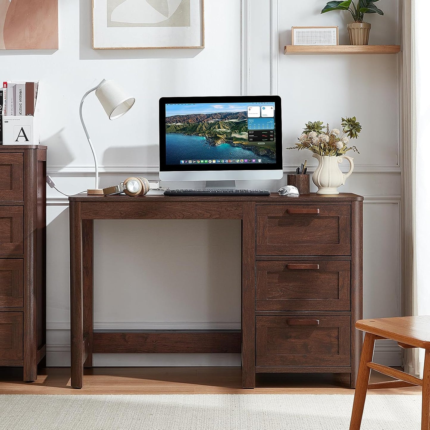 Dark walnut executive desk with three drawers and open under-desk shelf