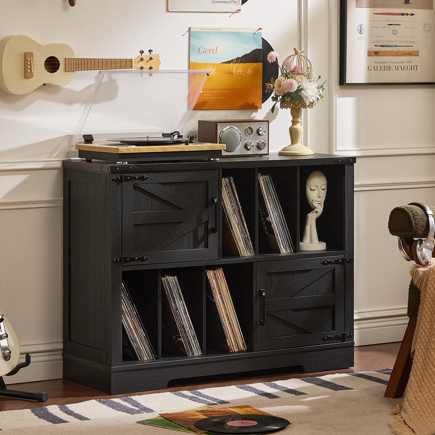 Record player cabinet with open record shelves and barn-style doors, dark finish