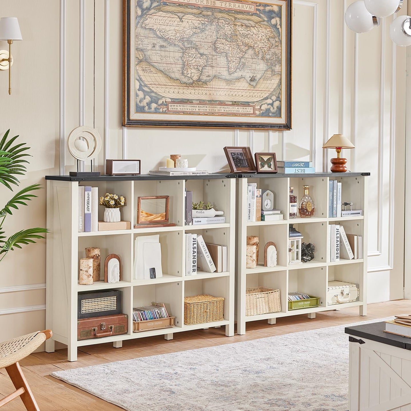 White open bookcase with cubby shelves and wide top for books and framed decor