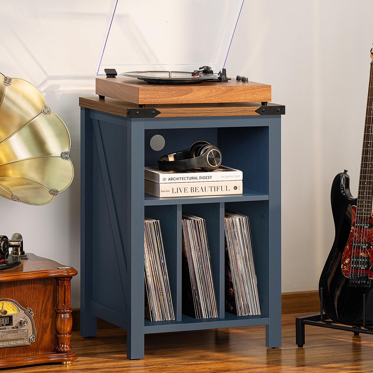Navy blue record player stand with wood top and open shelves for vinyl records