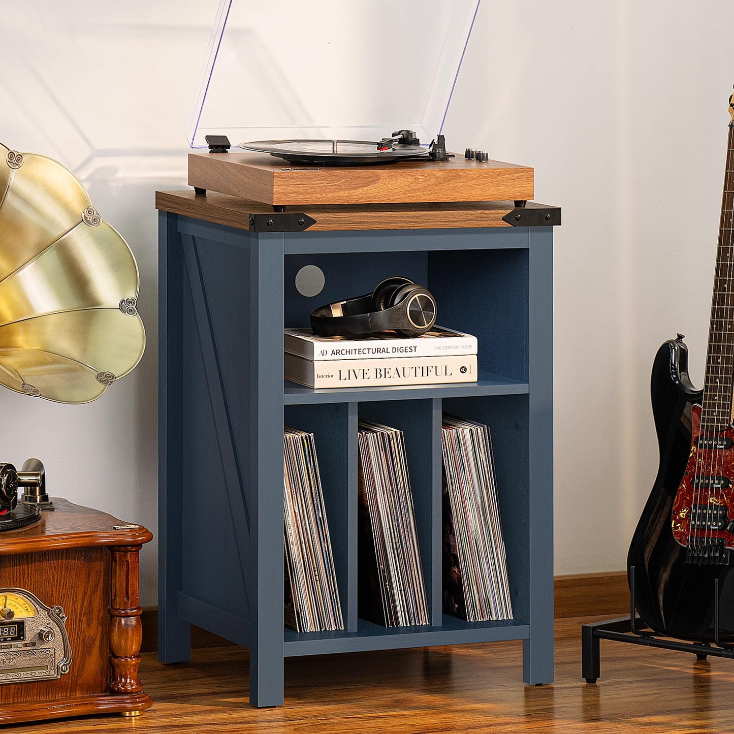 Navy blue record player stand with wood top and open shelves for vinyl records