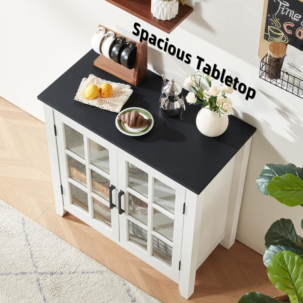 White sideboard buffet cabinet with two glass doors and black tabletop surface