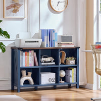 Navy blue low bookcase with open cubby shelves for books and decor