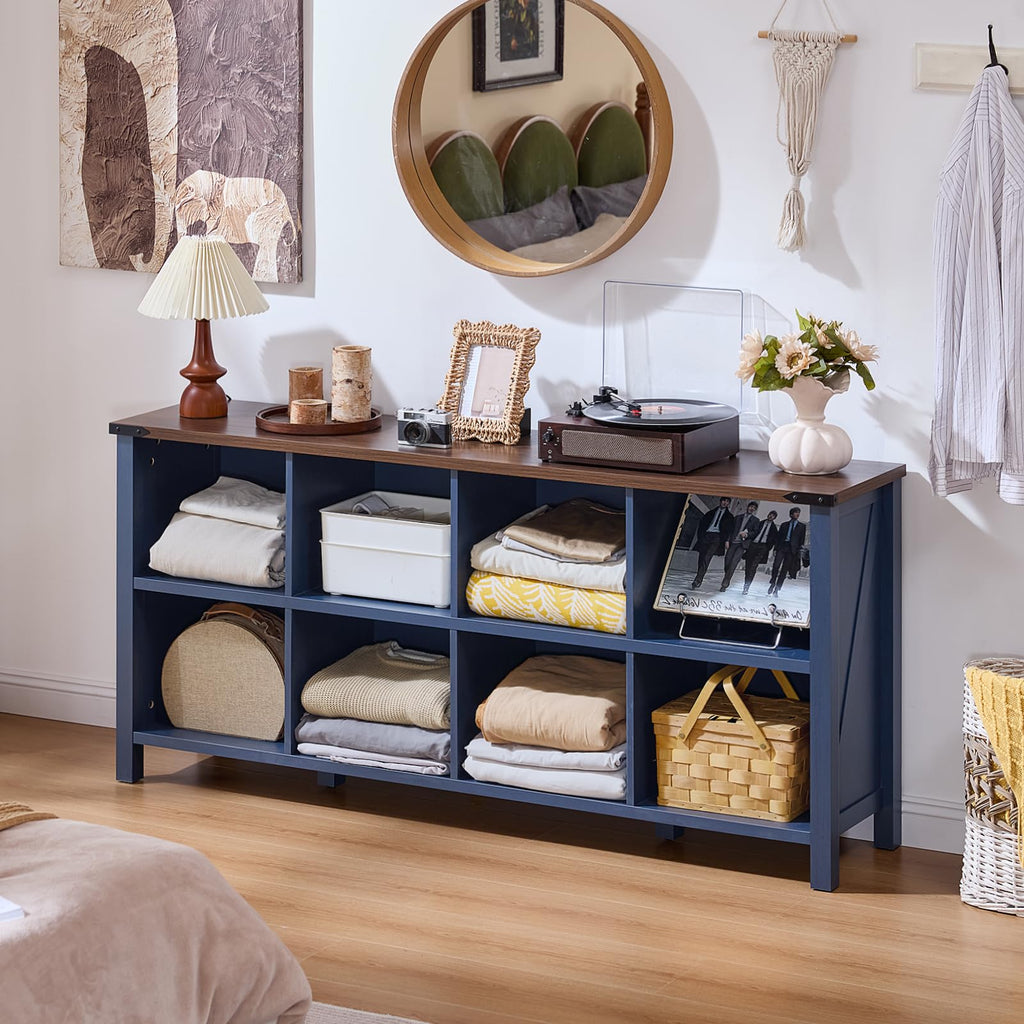 Dark blue console bookcase with open cubby storage and long tabletop