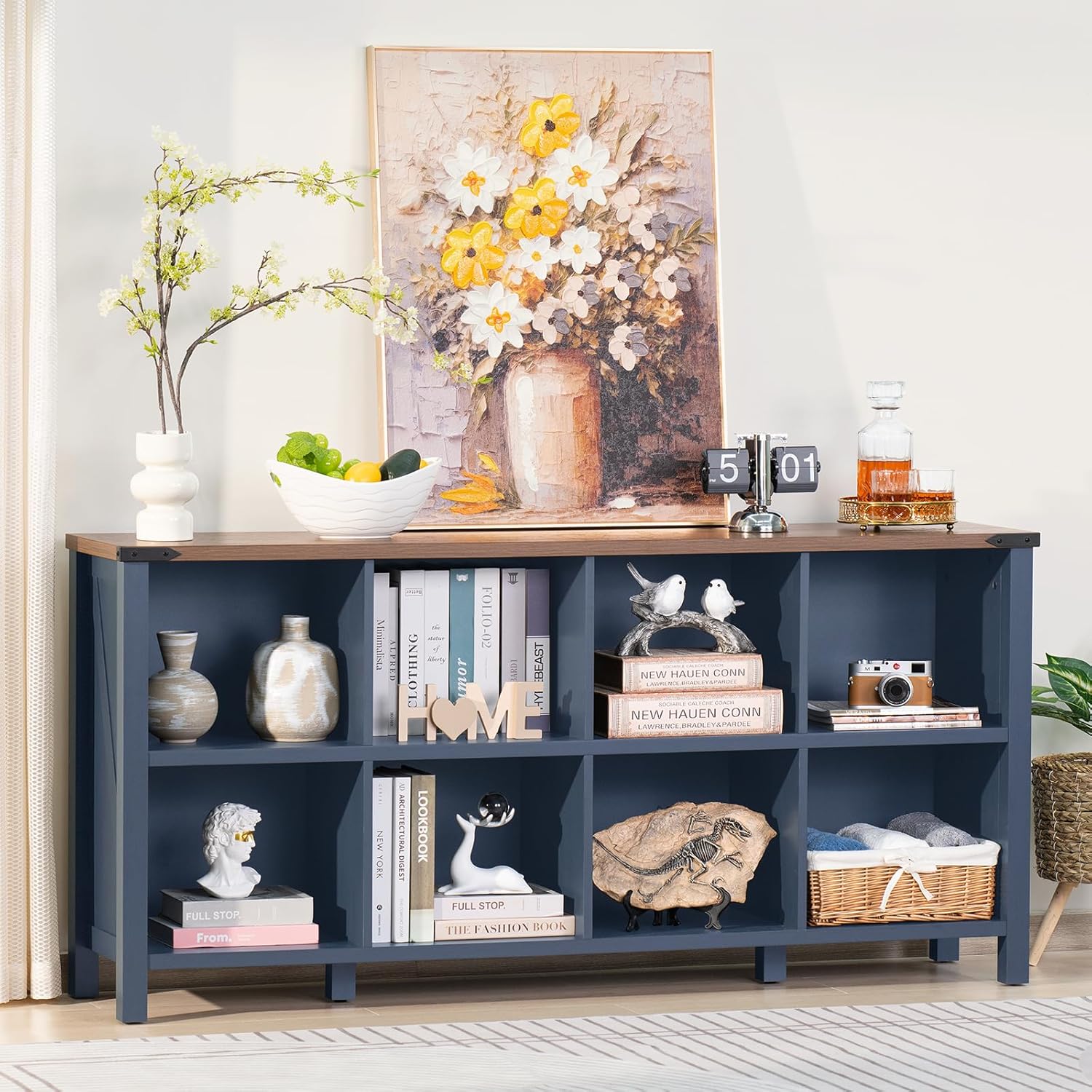 Navy blue 8-cube bookcase console with open storage cubbies and dark wood top