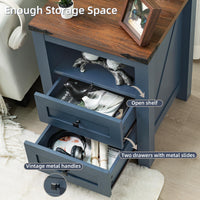 Blue nightstand with open shelf and two drawers with metal slides, items inside