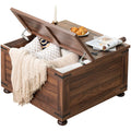 Brown wood farmhouse coffee table with open flip-top lid and hidden storage